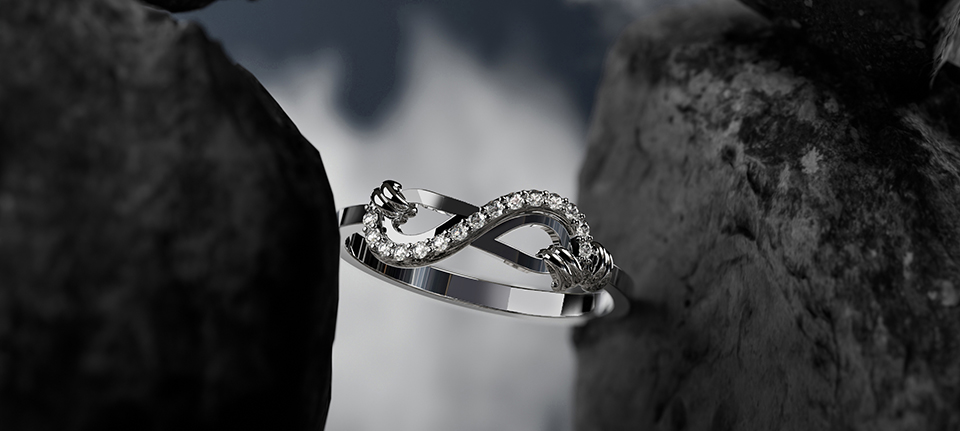 Elegante anel de platina com acentos de diamante exibido entre rochas escuras, destacando sua durabilidade e luxo na comparação de joias.