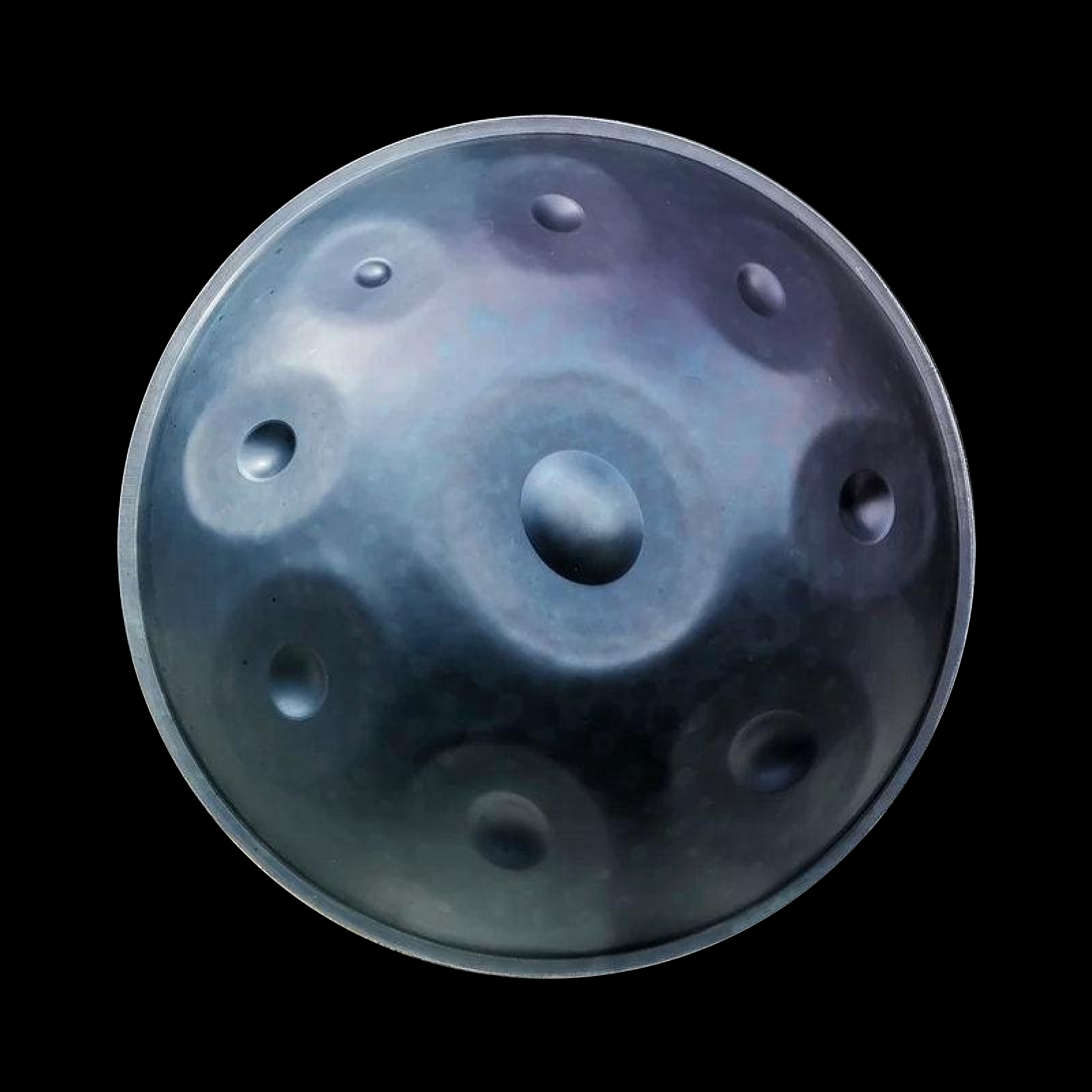 A D Kurd handpan with multiple indentations on a black background, representing the focus on the knuckle technique in the article.
